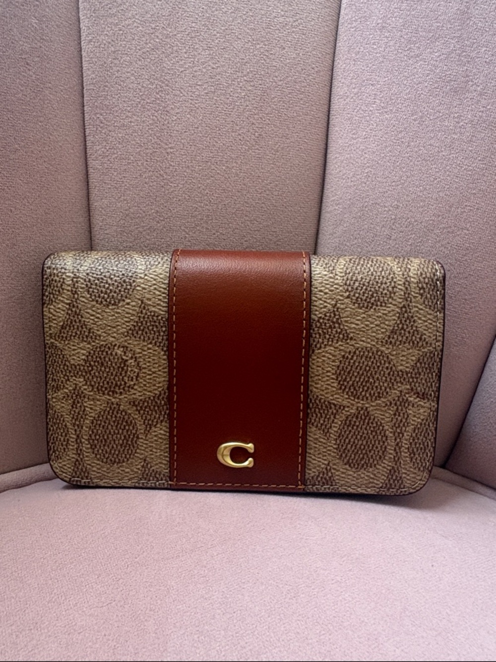 Essential Slim Card Case
In Signature Canvas brass/tan rust